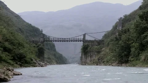 Bridge construction across river Stock Footage 261632984