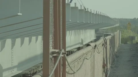 Bridge construction, iron structures, shadows from cars Stock Footage 278400987