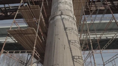 Bridge construction, stone columns, metal structures Stock Footage 275336249