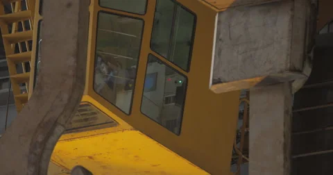 Bridge Crane With Worker In Pilot Cabin (4K) Stock Footage 60769526