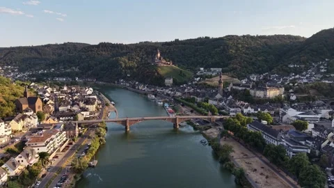 A bridge crosses the Moselle River below Cochem Castle in Germany Stock Footage 342335731