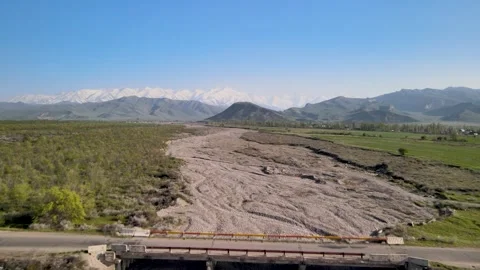 A bridge crossing a dried-up riverbed Stock Footage 338332698