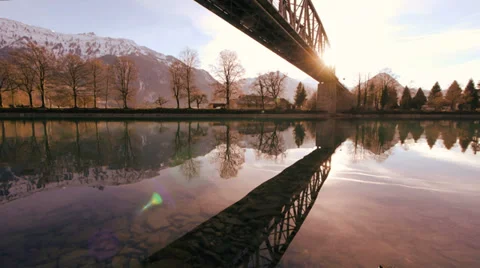 Bridge crossing lake. water reflection. nature landscape. sunset Stock-Footage 34519736