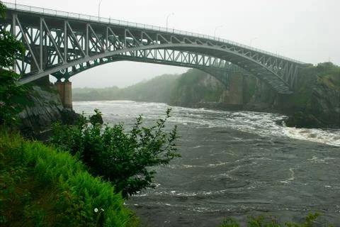 Bridge crossing the river Stock Photos