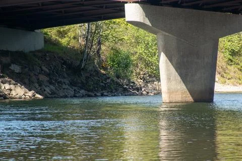 A bridge crossing a river Stock Photos