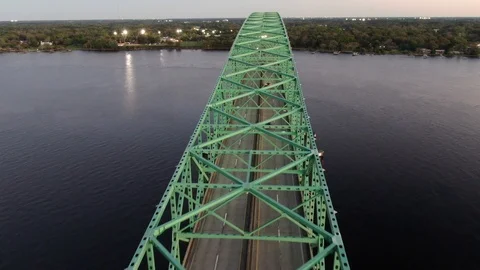 Bridge deck reaching across dark water in Jacksonville Florida Stock-Footage 104734310