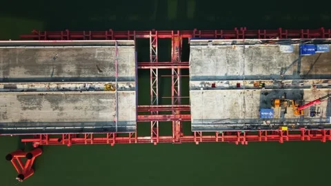 Bridge demolition over river in China; drone view of structure being dismantled 스톡 동영상 325717697