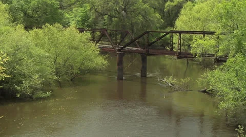 Bridge, DERELICT OCKLOCKNEE RIVER BRIDGE NEAR JACKIE ROBINSONS'S BIRTHPLACE Stock Footage 22555891