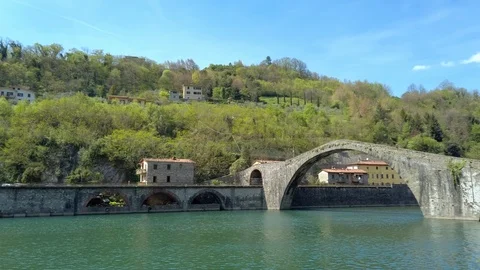The Bridge of the Devil (Ponte della Maddalena) in Garfagnana Lucca gimbal pan Stock Footage 107005889