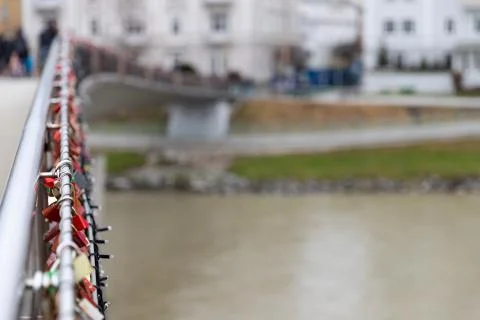 Bridge full of love locks (padlocks) and Christmas lights in Salzburg, Austri Stock Photos