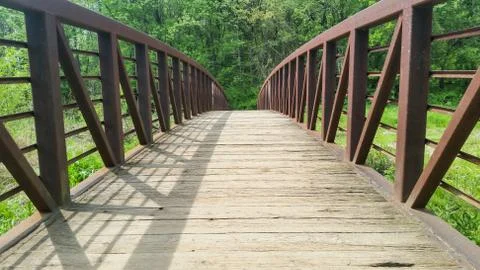 Bridge in the Green Outdoors in a Spring Day Stock Photos