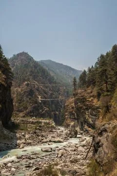 Bridge in the Himalayas Stock Photos