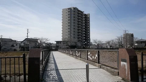 Bridge in Japan with an apartment as background Video stock 86851428
