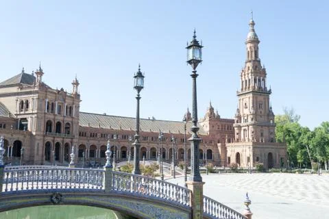 Bridge, lamp post and tower at Spain square Stock Photos
