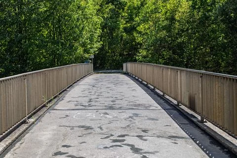 Bridge Leading Into The Forest Stock Photos