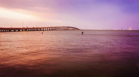 Bridge Leads to South Padre Island, Texas at Sunset - Time Lapse 스톡 동영상 63491953