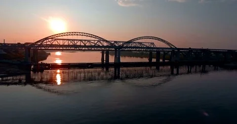 A bridge in the light of a setting sun Stock Footage 73560053