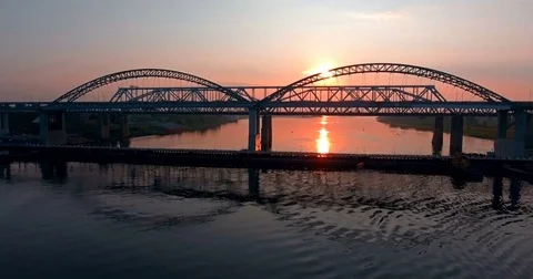 A bridge in the light of a setting sun Stock Footage 73683597