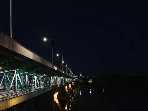 A bridge with lights on it at night Stock Photos