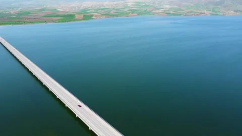 Bridge on the middle of a Lake Stock Footage 247956874