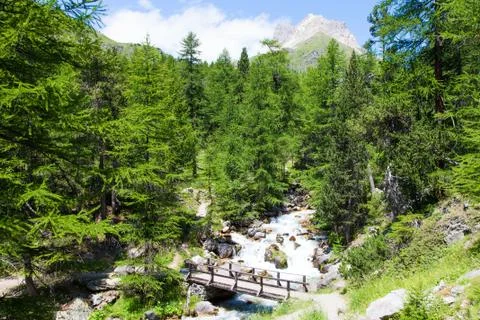 Bridge on mountain river Stock-Fotos