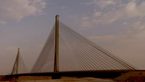 A bridge with moving clouds in the background. Stock Footage 120070166