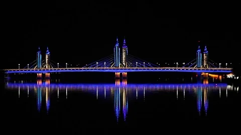 Bridge at night, Changing colors Stockbeeldmateriaal 84738812