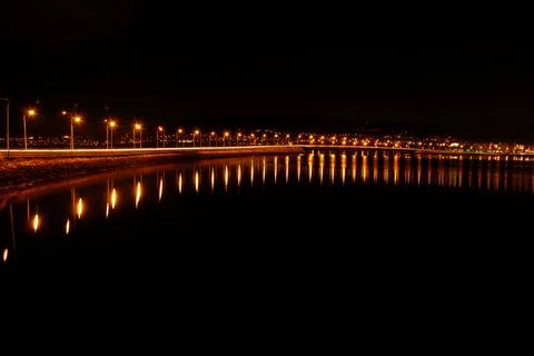 Bridge by night with the lights on Stock Photos