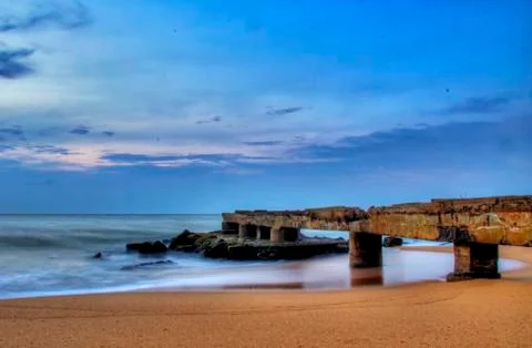 Bridge into the ocean Stock Photos