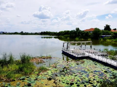 A bridge or pontoon that extends out with seating for guests or customers Stock Photos