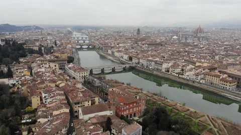 A bridge over the Arno river in Florence from a drone Stock Footage 144838841
