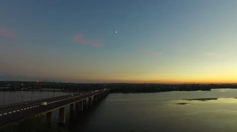 Bridge over a big river in the twilight Stock-Footage 67380851