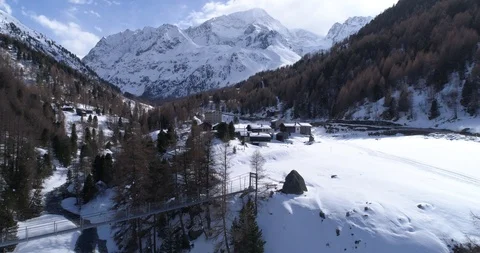 Bridge over Borgne d'Arolla, and la Mota hamlet - Aerial 4K Stock Footage 106228941