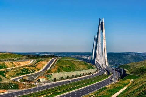 Bridge over Bosphorus under clear blue skies Stock Photos