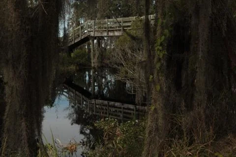 Bridge over bubbled waters Stock Photos