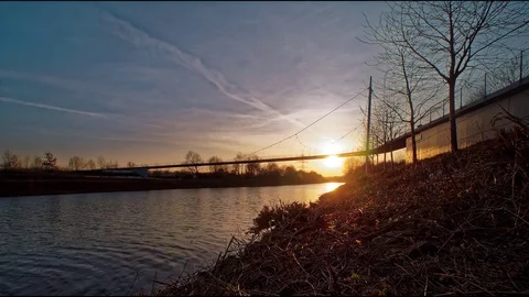 Bridge over canal sunset time laps Video stock 73790649