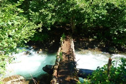 Bridge over a clean mountain stream on a hiking trail leading to Silver Lakes Stock Photos