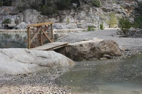 Bridge over the creek Stock Photos