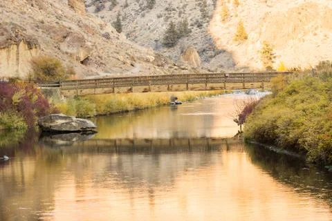 Bridge over the Crooked River at the beginning of the river trail at Smith Rock Stock Photos