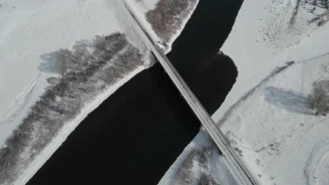 Bridge over dark river in winter Stock Footage 166171348