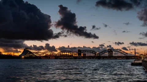 Bridge over Daugava river Riga Latvia timelapse sunset Stock Footage 259213023