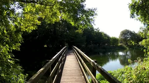 Bridge Over Gentle Summer River Stock Footage 12143701