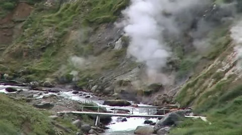 Bridge over a mountain river Stock Footage 10573382