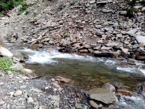Bridge over mountain river Stock Photos