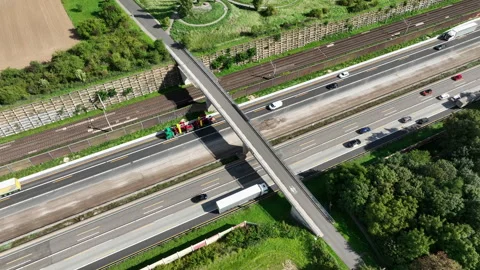Bridge over a multiple lane highway - aerial view 動画素材 250895377