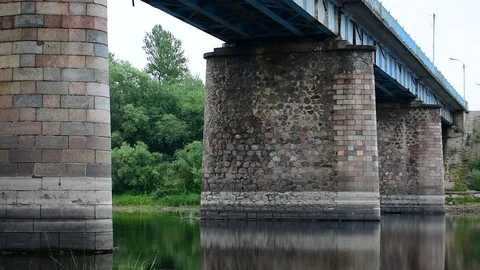 Bridge over a not wide river Stock Footage 117112178