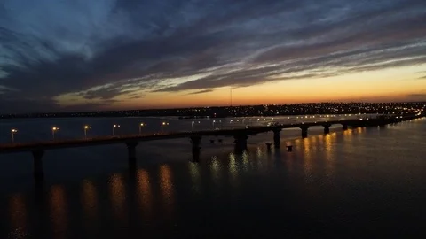 Bridge over the river and the unique beauty of sunset 스톡 동영상 103463451