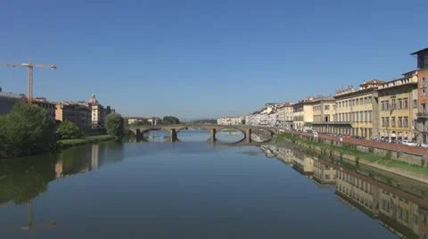 Bridge over river arno.Building is reflected in water.Florence. Stock-Footage 12532257