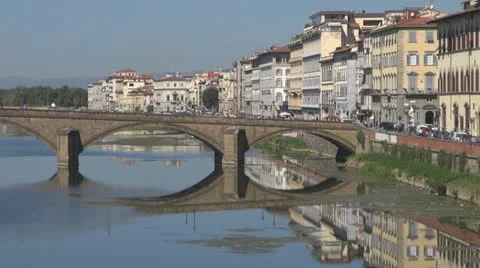 Bridge over river arno.Building is reflected in water.Florence. Stock-Footage 12532281