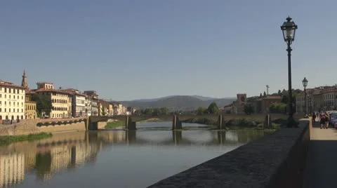 Bridge over river arno.Building is reflected in water.Florence. Stock-Footage 12533802